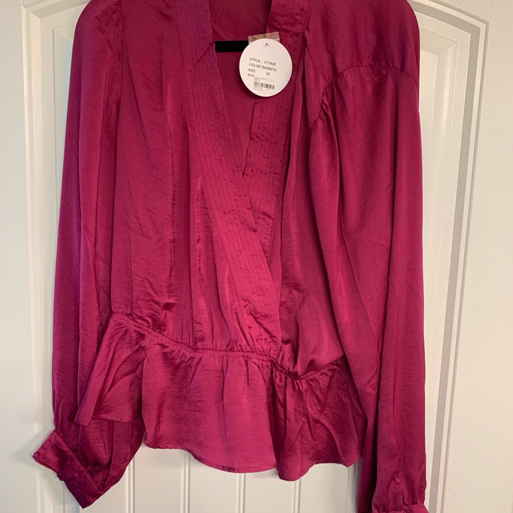 Haute Curve size 3x deep purple in color. V neck with elastic waist with peplum